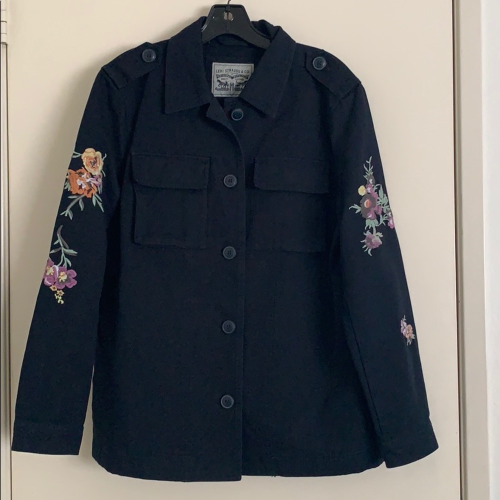 Levi’s black denim jacket with embroidered flowers